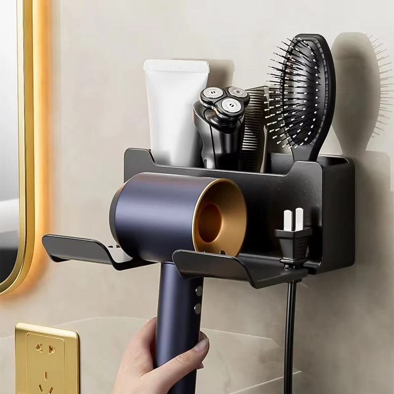 Black DryDock hair dryer holder wall-mounted with dryer and accessories in modern bathroom