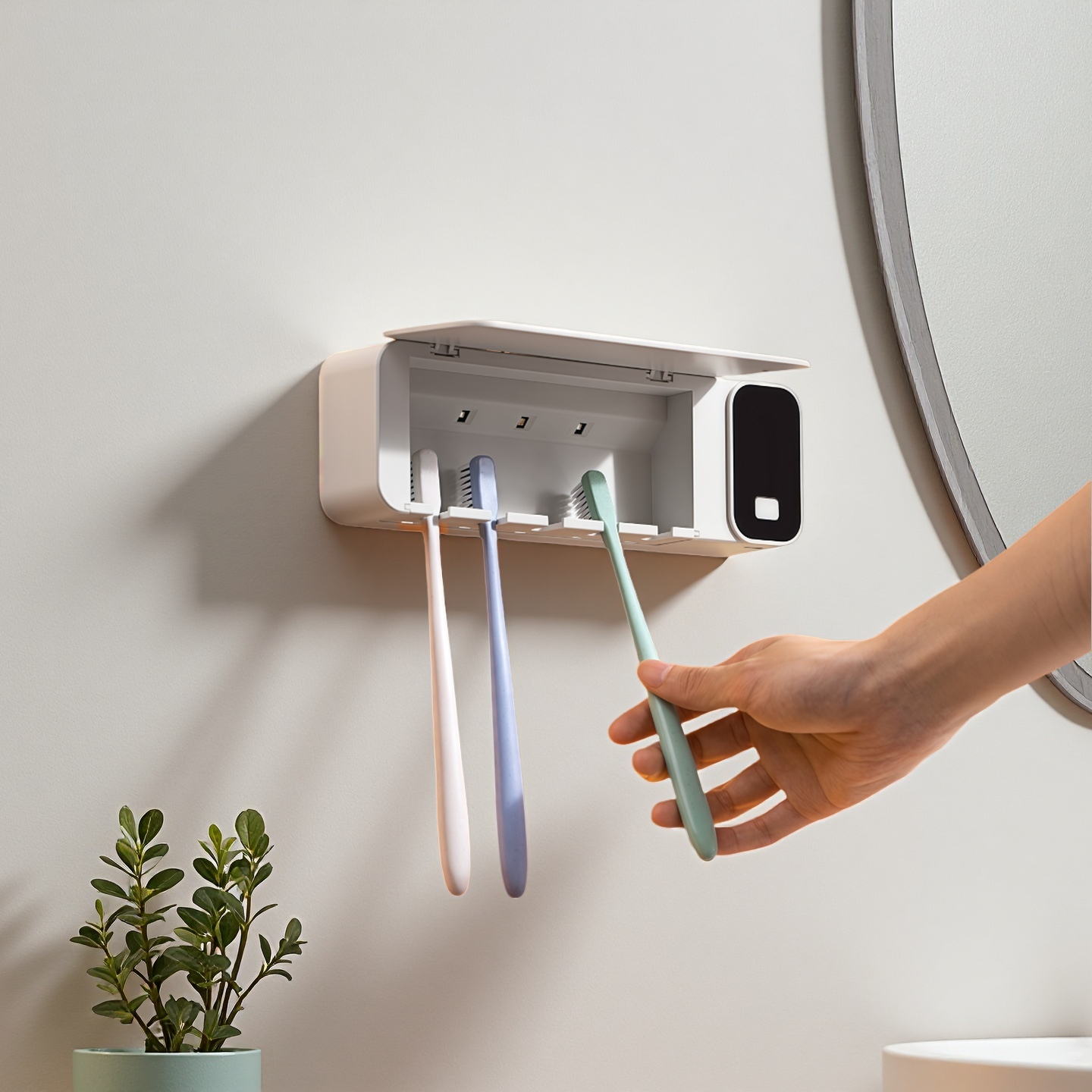 White AuraGuard UV Wall Mount Toothbrush Holder with toothbrush